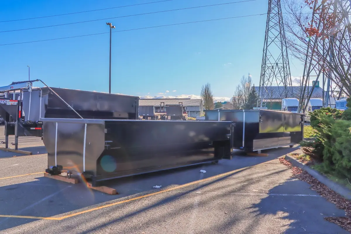 Roll-off dumpster ready for waste disposal at job site for Construction Dumpster Rental in Palestine